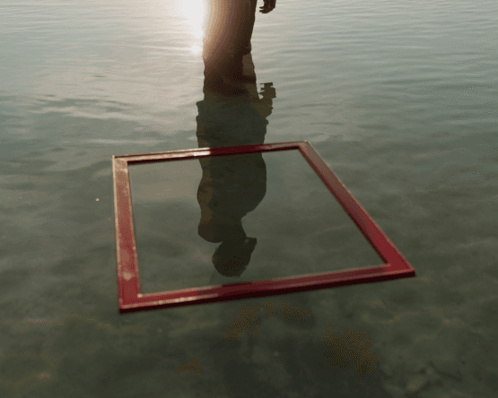 poster frame floating in water